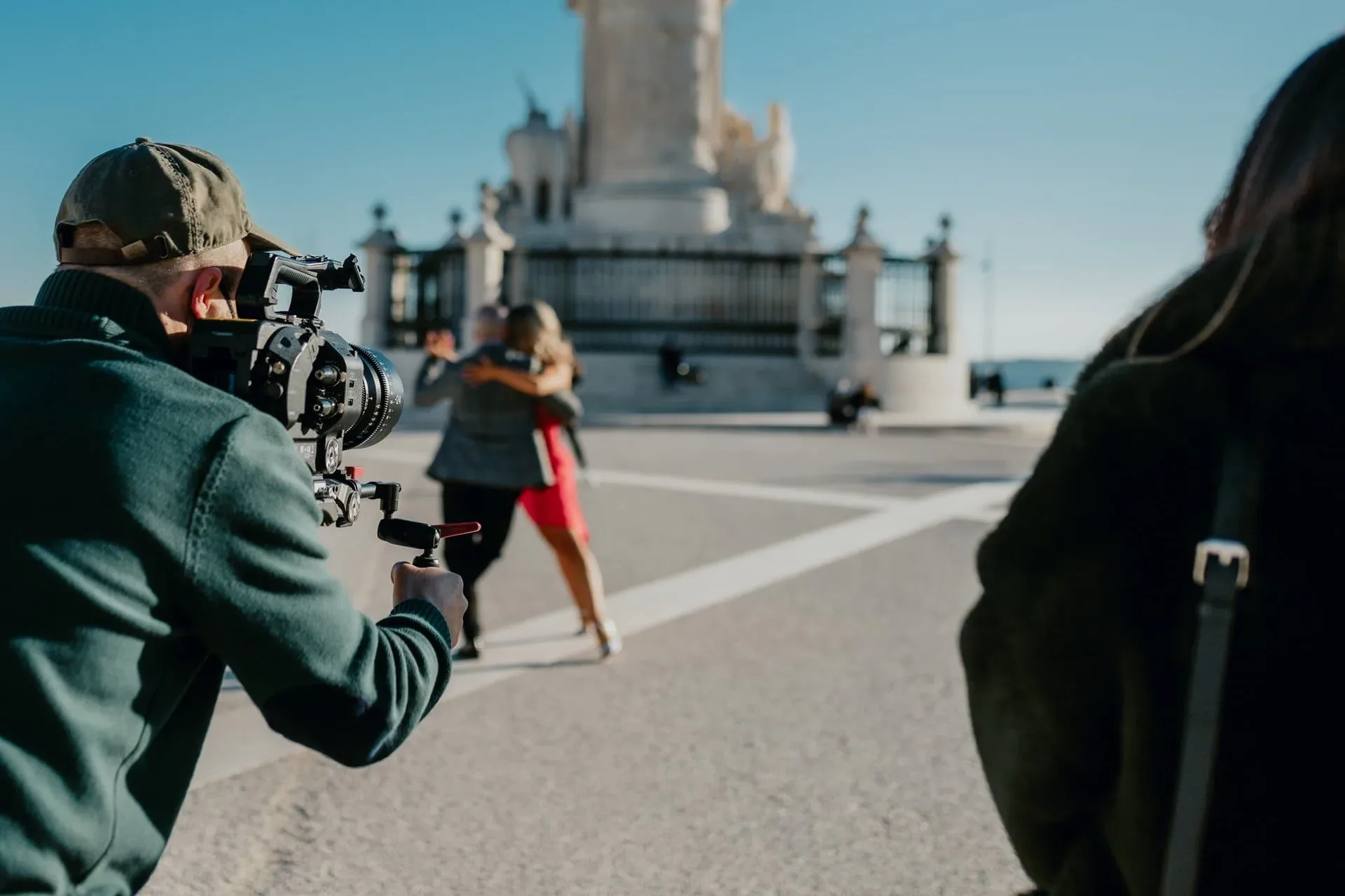 making of photoshoot, woman and man dancing