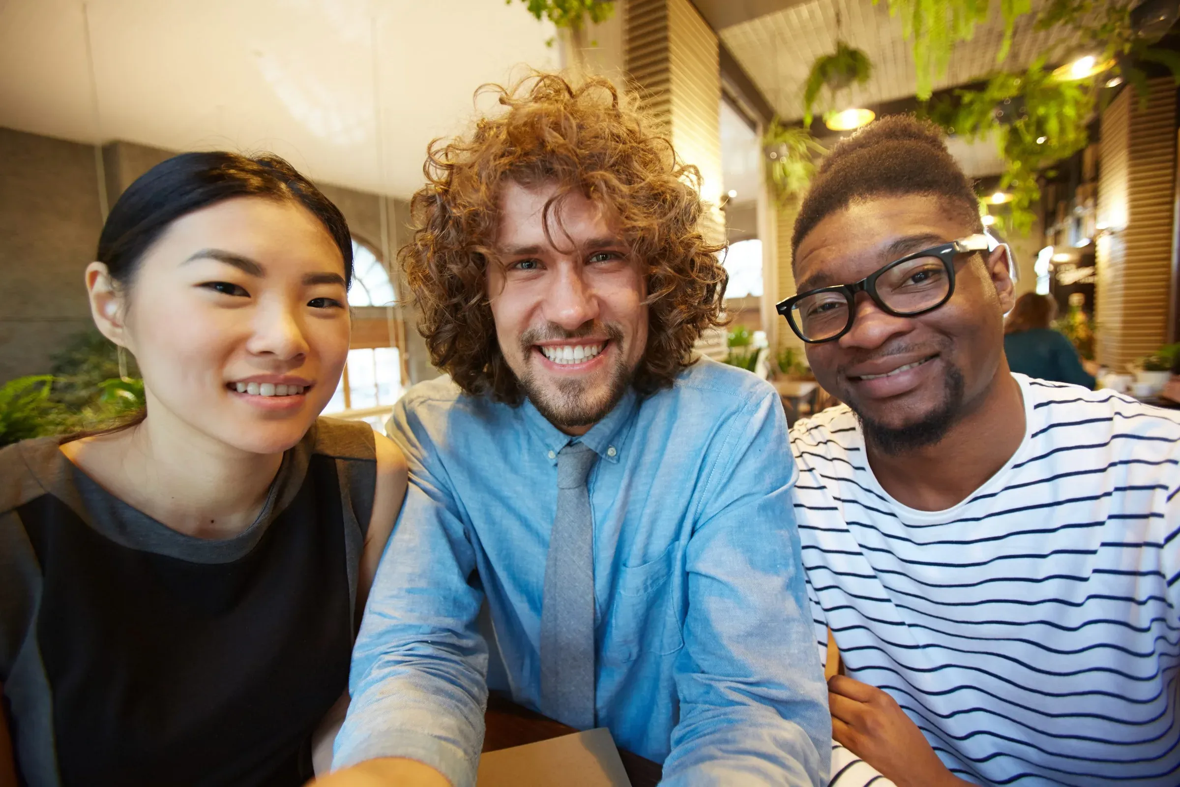 friends gathered cafe scaled