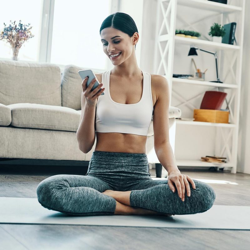 woman uses mobile phone