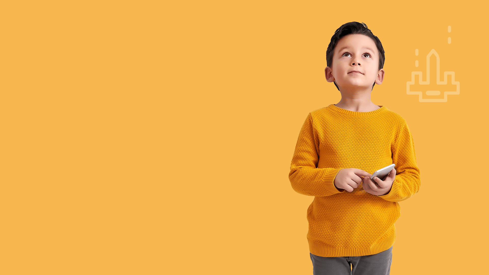 menino segurando um telemovel